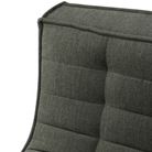 The N701 Modular Sofa from Ethnicraft with moss eco fabric focusing on the backrest.