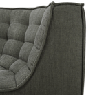 The N701 Modular Sofa from Ethnicraft with moss eco fabric showing the curved backrest.