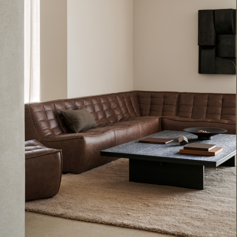 The N701 Modular Square Corner Sofa 1-3 Chestnut from Ethnicraft in a living room.