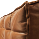 The N701 Modular Square Corner Sofa 2-3 Old Saddle from Ethnicraft with a close-up from the side angle.