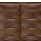 The N701 Round Leather Footstool from Ethnicraft with a close-up from the front angle.