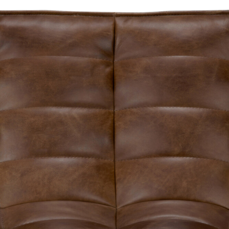 The N701 Round Leather Footstool from Ethnicraft with a close-up from the front angle.