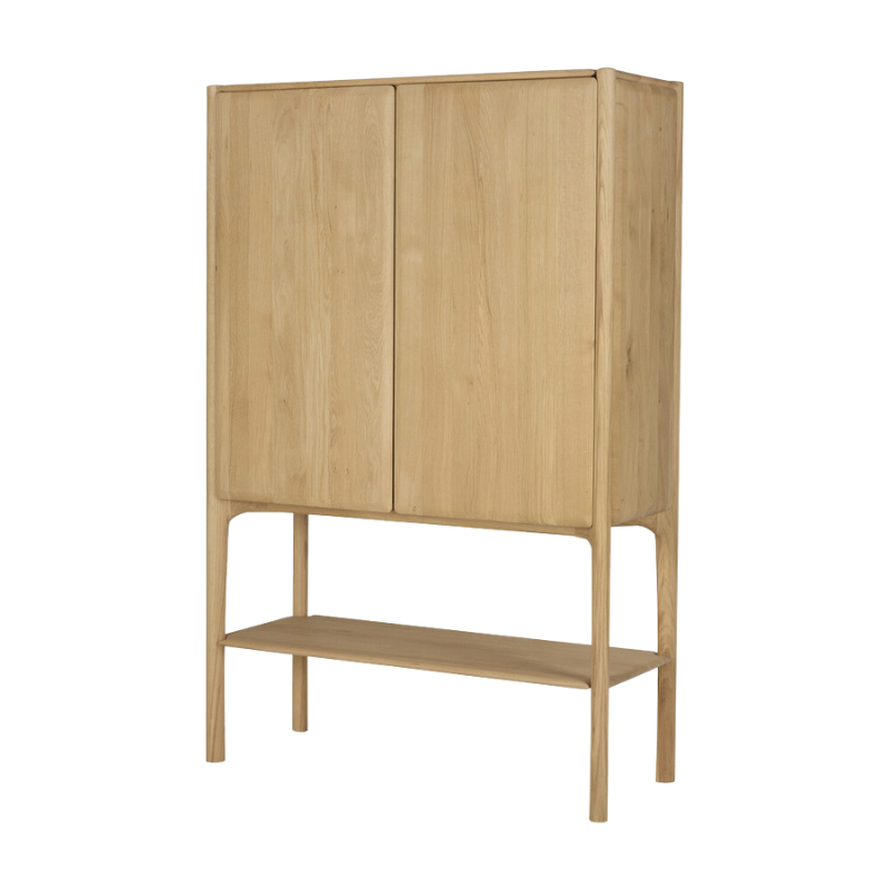 The Oak PI Cupboard by Ethnicraft stands from the side angle.