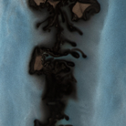 The Rectangular Organic Valet Tray Slate from Ethnicraft with the details of the hand-printed design.