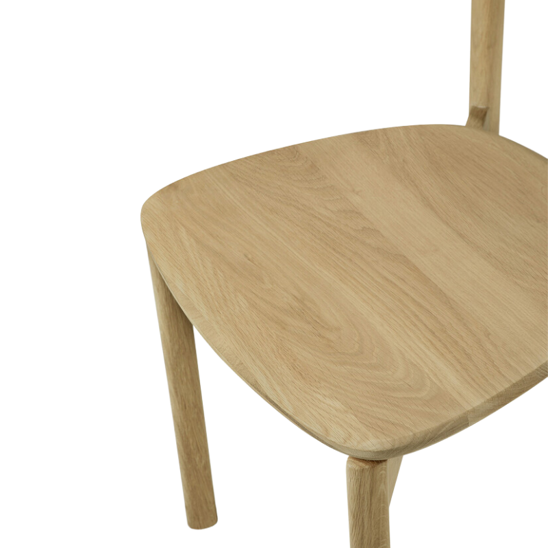 The Risu Dining Chair by Ethnicraft in detail of the seat.
