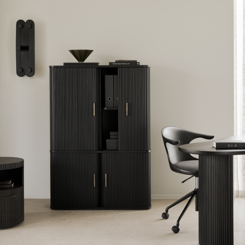 The Roller Max Filing Cabinet from Ethnicraft in a home office.