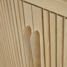 Door handle detail of the 66-inch Roller Max Sideboard from Ethnicraft in oak.