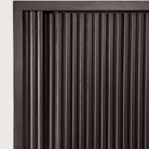 Detailed image of the front door of the 88-inch Roller Max Sideboard from Ethnicraft in teak off black.