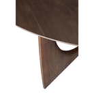 The brown teak Round Geometric Dining Table from Ethnicraft in detail.