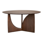 The Round Geometric Dining Table from Ethnicraft in brown teak.