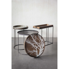 The white Tree Wooden Tray from Ethnicraft with a variety of other trays.