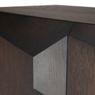 The Stairs Cupboard from Ethnicraft focusing on the top and detail of the cupboard.