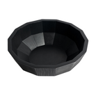 The Striped Bowl from Ethnicraft in a studio.