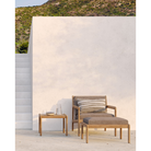 The Stripes Outdoor Cushion from Ethnicraft in an outdoor family space.