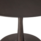 Illuminee Torsion Round Dining Table by Ethnicraft in brown oak with tabletop close-up. all-groups