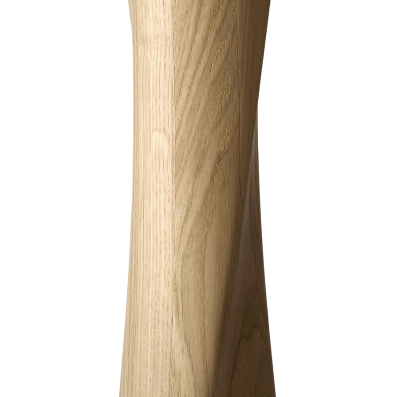 The Torsion Square Dining Table from ethnicraft with the woodwork details.