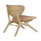 The Upholstered Eye Lounge Leather Chair by Ethnicraft from back side.