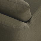 The Weave Lounge Chair by Ethnicraft in green with texture details.