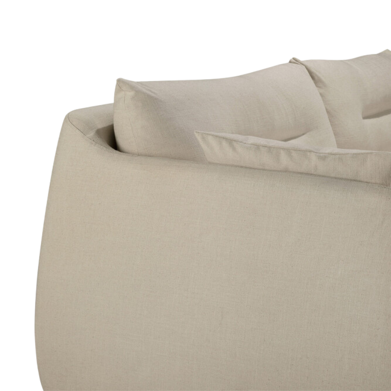 The bone Weave Sofa by Ethnicraft with a curved corner.