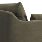 The Green Weave Sofa by Ethnicraft focuses on the armrest.