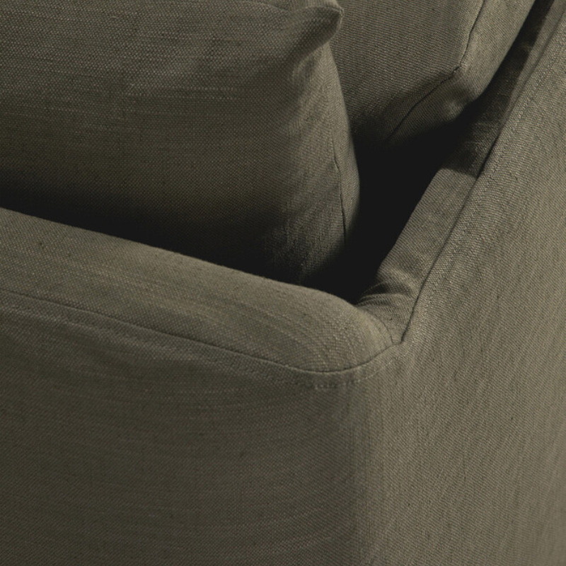 The Green Weave Sofa by Ethnicraft with a close-up from an angle.