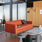 The black 265 Wall Lamp from Flos in a home office.