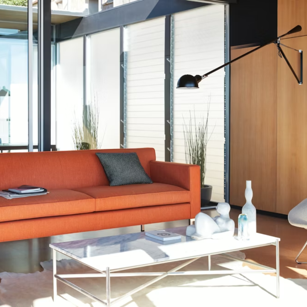 The black 265 Wall Lamp from Flos in a lounge.