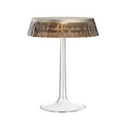 The Bon Jour Table Lamp from Flos in matte chrome with fumee crown.