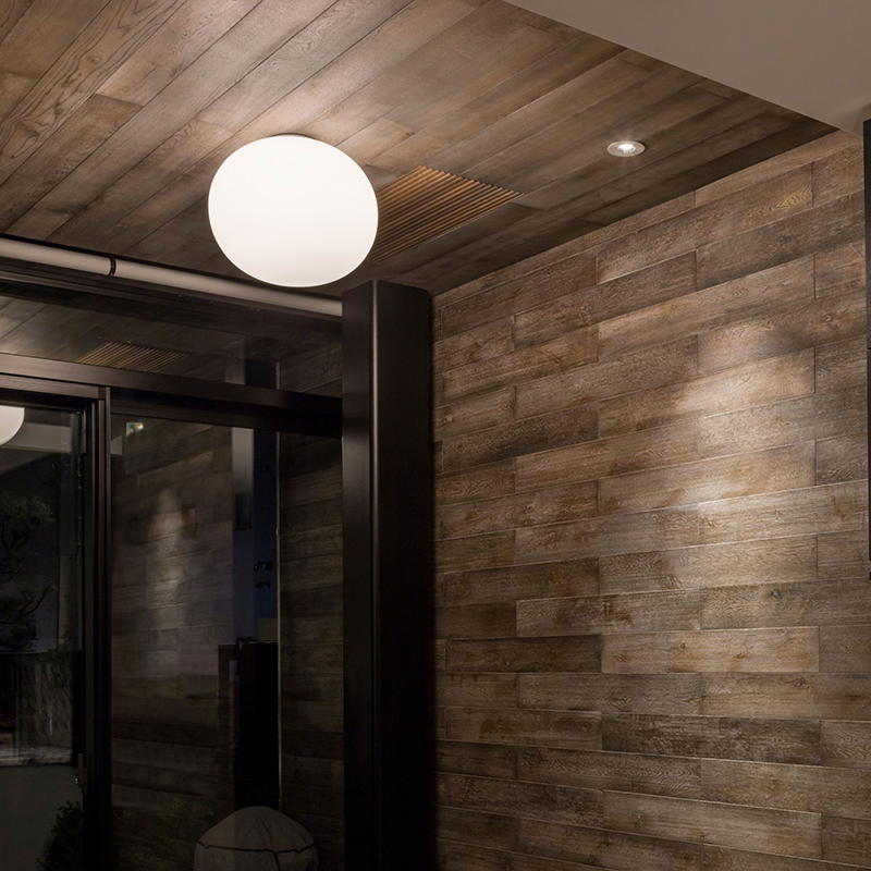 The Glo Ball 2 Ceiling Light from Flos in an entry.