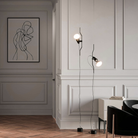 The Parentesi Lamp from Flos in Black in an open concept home.