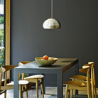 The Splugen Brau Suspension from Flos in a living space.