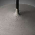 The Aplomb Large Pendant from Foscarini in concrete grey, focusing on the shade.