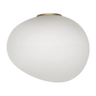 The Gregg 1 Semi Wall Sconce from Foscarini in small in gold.