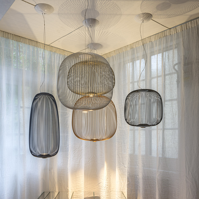 The Spokes 2 Pendant from Foscarini in a hallway.
