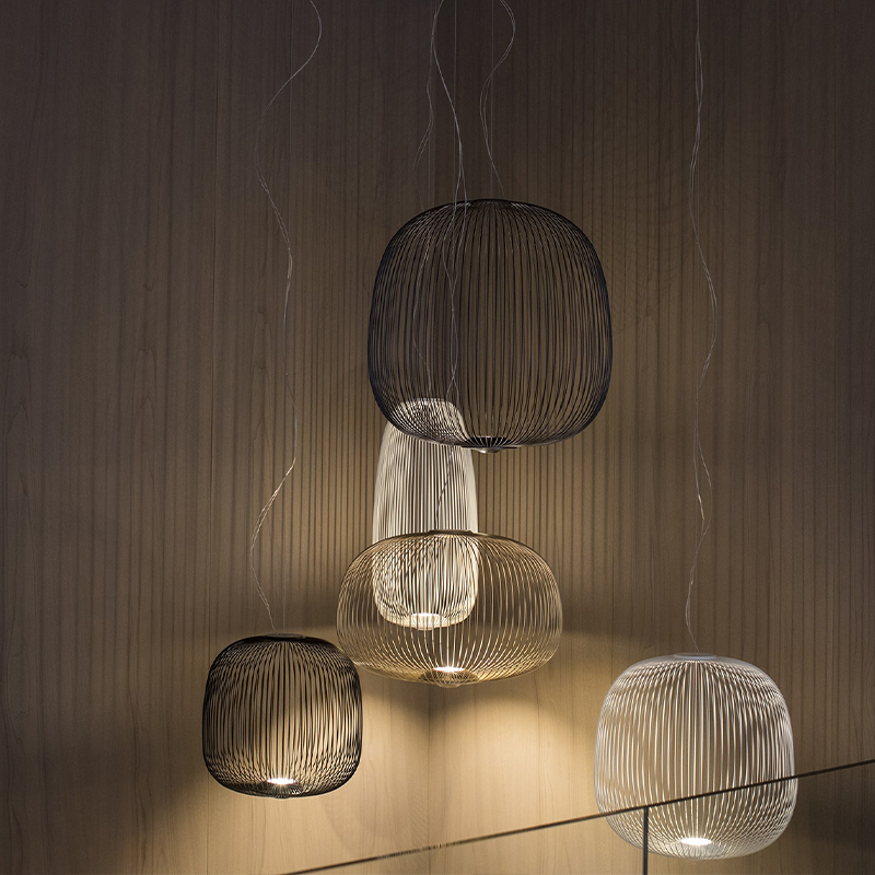 The Spokes 2 Pendant from Foscarini in a study room.
