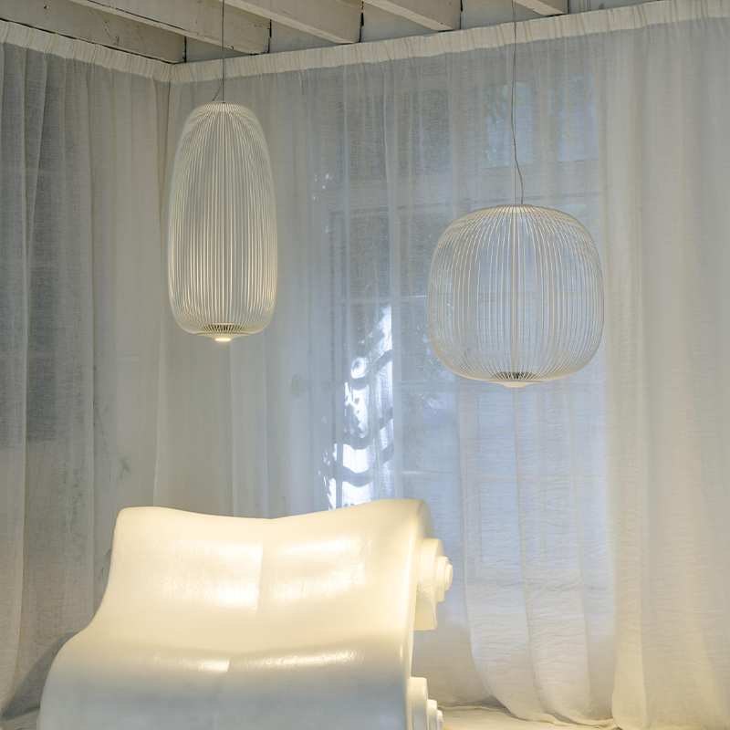 The Spokes 2 Pendant from Foscarini in white in a kitchen.