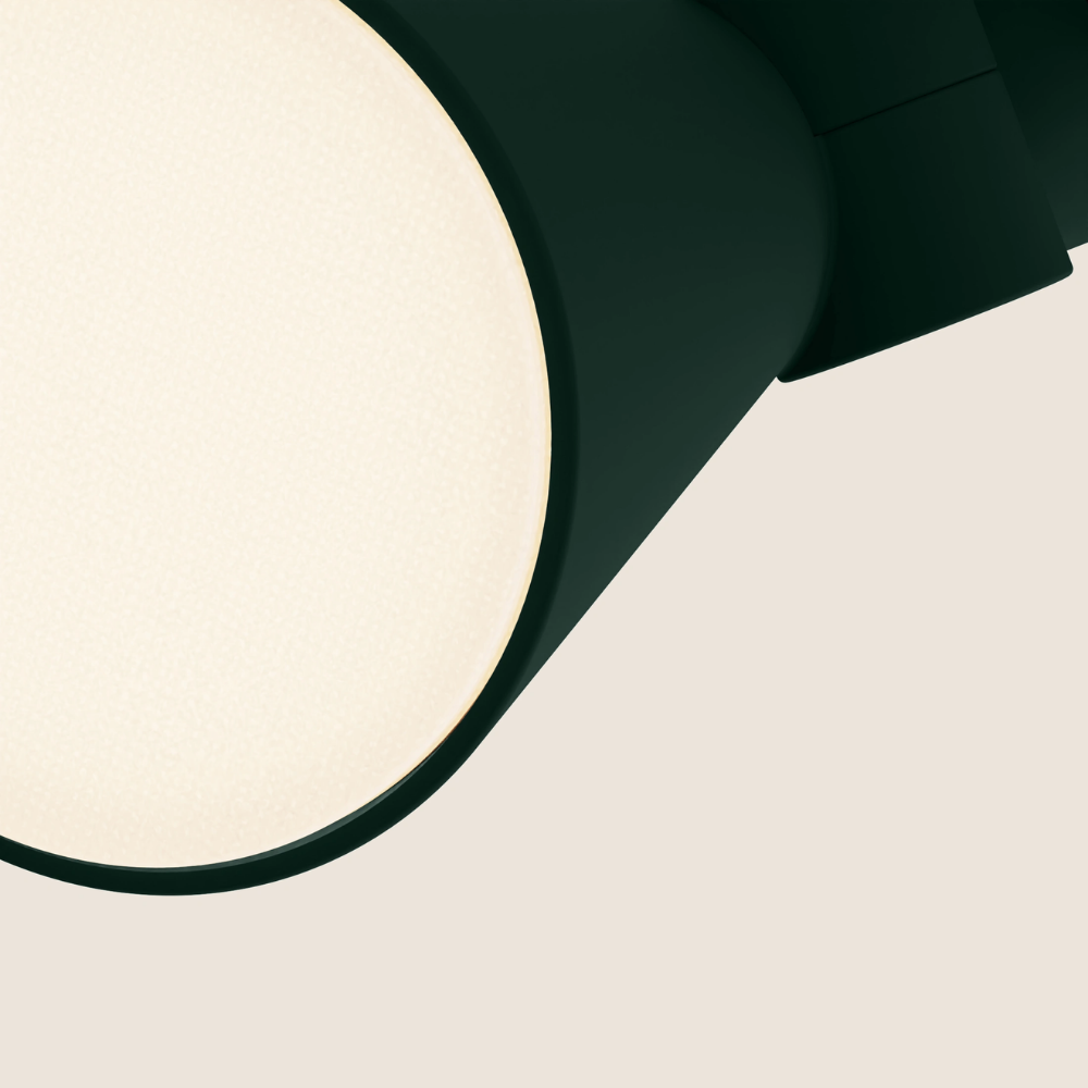 The forest Aim Clamp Light from Gantri close up.