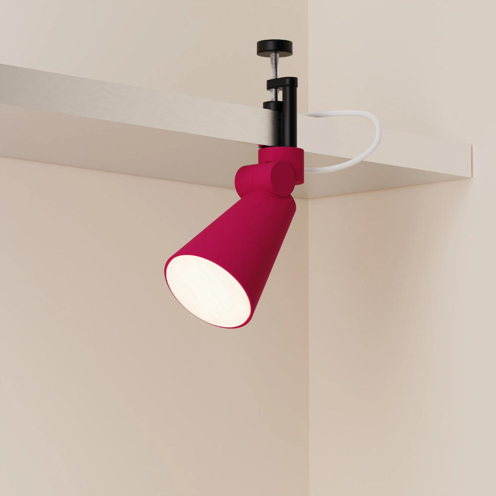 The hibiscus Aim Clamp Light from Gantri with the black clamp.