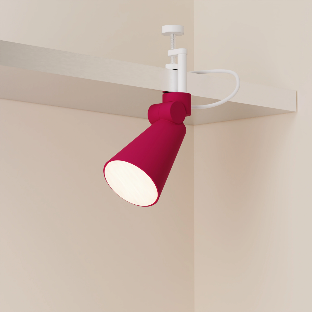 The hibiscus Aim Clamp Light from Gantri with the white clamp.