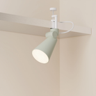 The meadow Aim Clamp Light from Gantri with the white clamp.