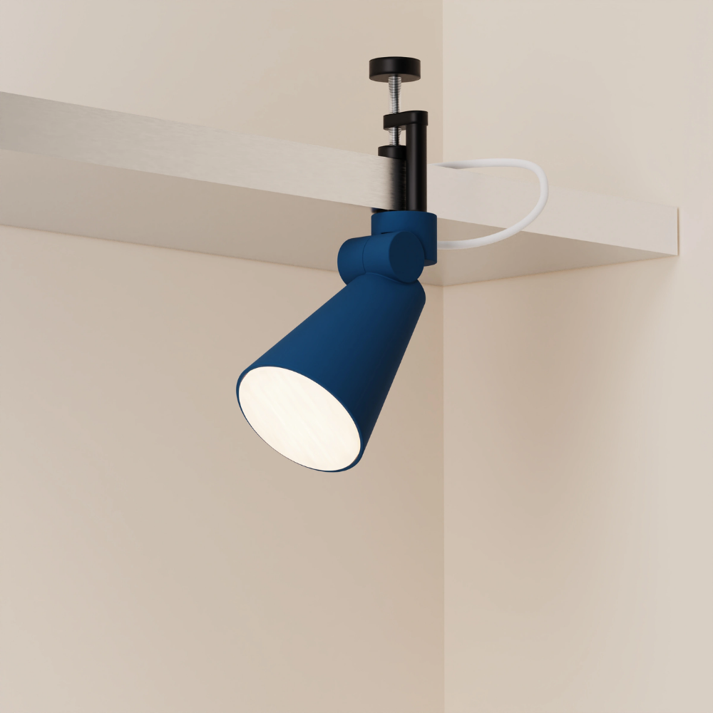 The midnight Aim Clamp Light from Gantri with the black clamp.
