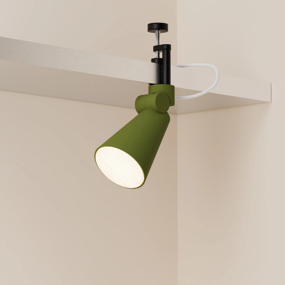 The olive Aim Clamp Light from Gantri with the black clamp.