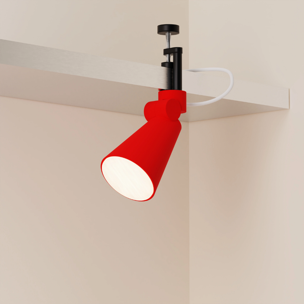 The poppy Aim Clamp Light from Gantri with the black clamp.