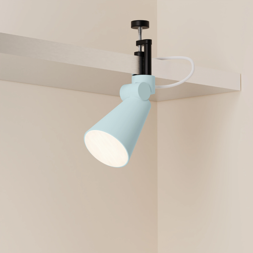 The sky Aim Clamp Light from Gantri with the black clamp.