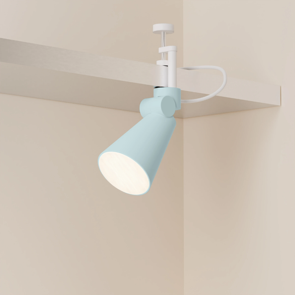 The sky Aim Clamp Light from Gantri with the white clamp.