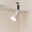 The stone Aim Clamp Light from Gantri with the black clamp.