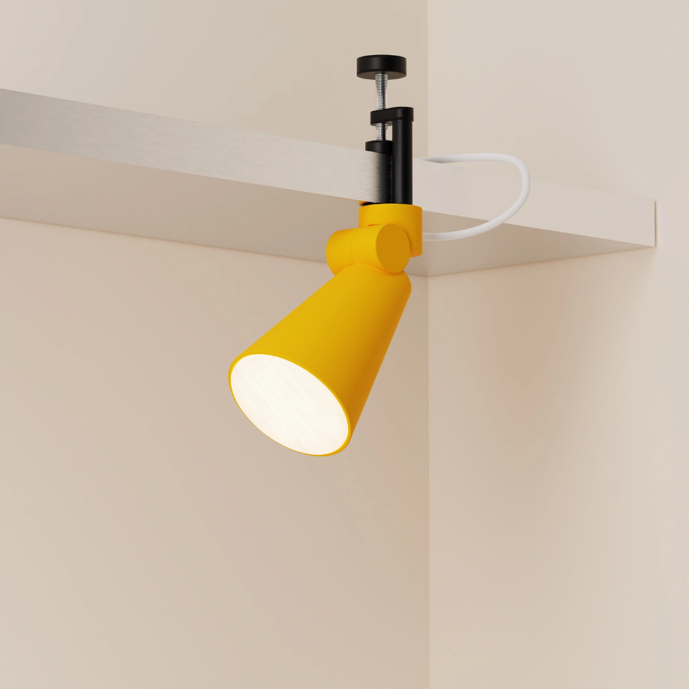 The sunrise Aim Clamp Light from Gantri with the black clamp.