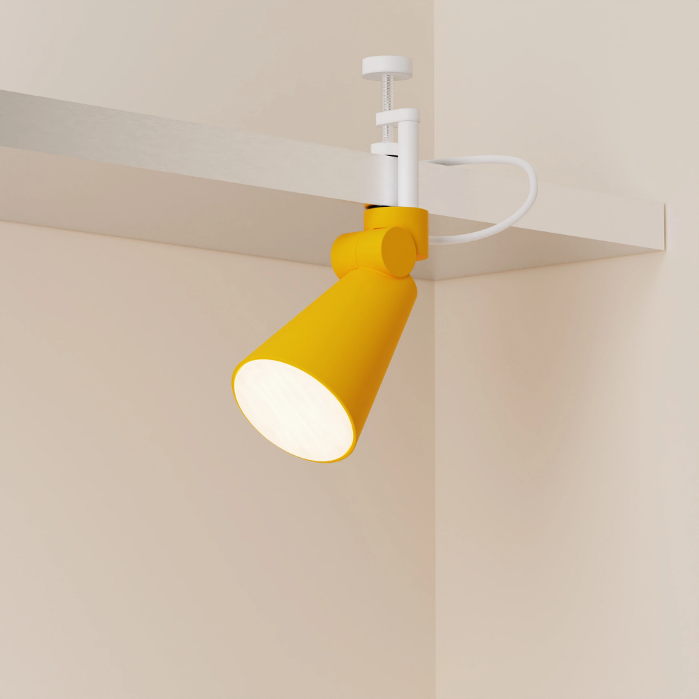 The sunrise Aim Clamp Light from Gantri with the white clamp.