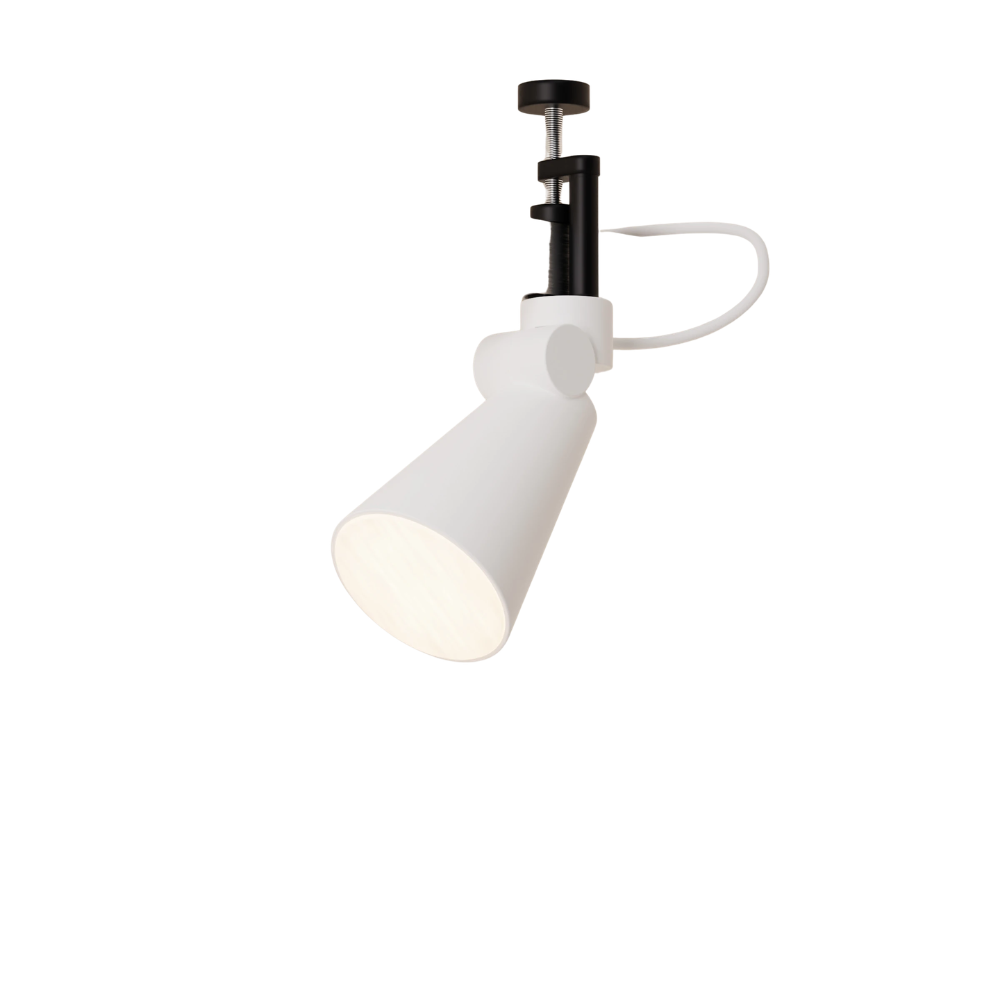 The snow Aim Clamp Light from Gantri with the black clamp on a white background.