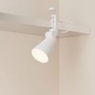 The snow Aim Clamp Light from Gantri with the white clamp.
